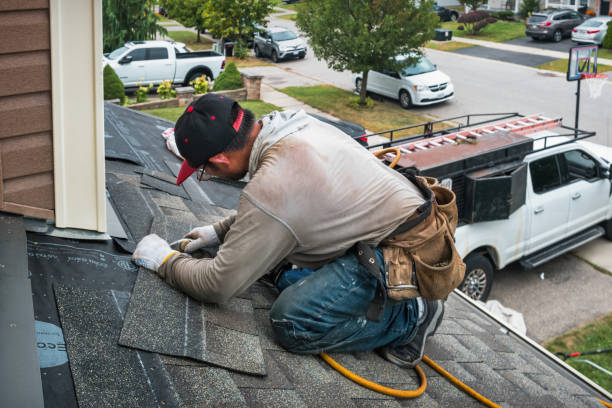 Professional Emergency Roof Repair technician working in Minster, OH